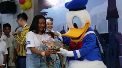 First Media Ajak Donal Duck Hibur Anak Panti Pondok Kasih Agape